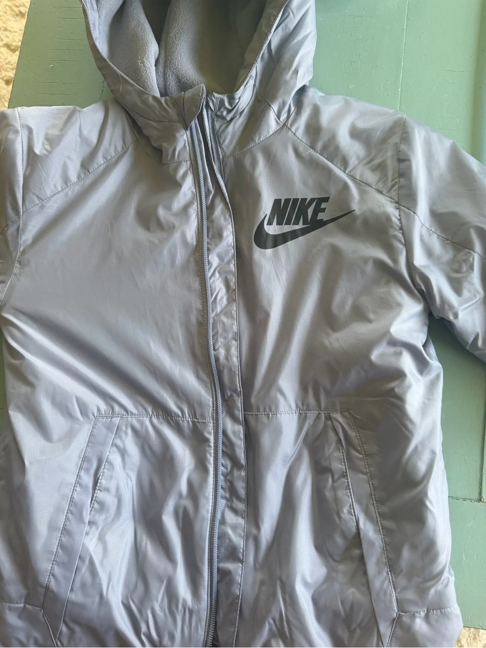Nike Kids Light Gray Hooded Raincoat with Black Logo